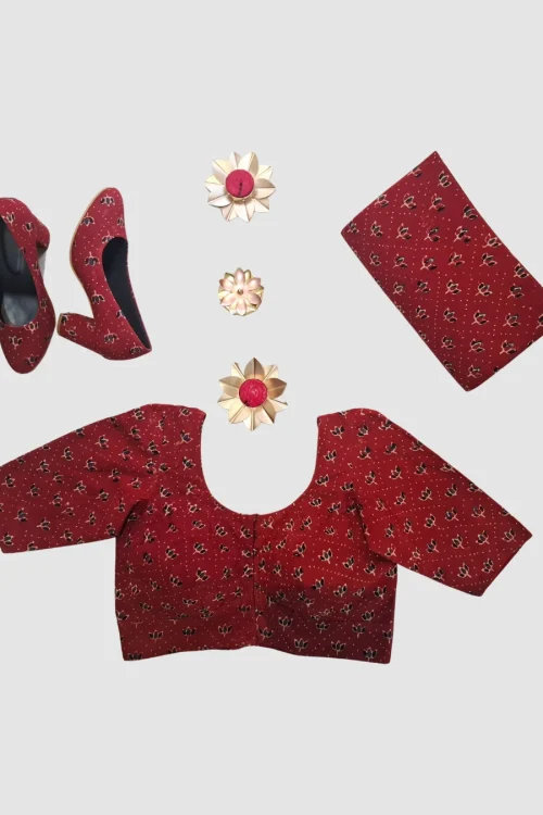 Handblock-printed cotton with small all-over floral motifs and dotted detailing.