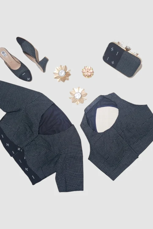 Handloom cotton with micro-checks and subtle Ikat-inspired border detailing